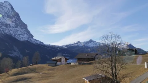 Sun shining by the Schreckhorn, Bernese Oberland, Canton of Bern, Switzerland, Stock Footage