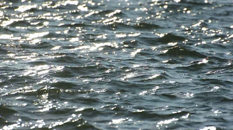 Sun shining in sea waves Stock Footage 22747994
