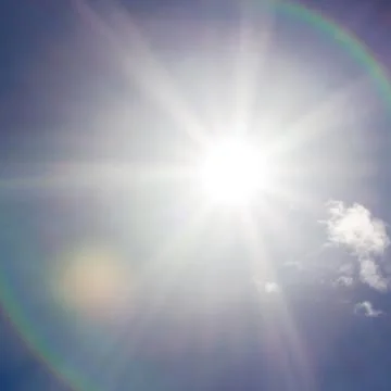 Sun shining in the sky Stock Photos