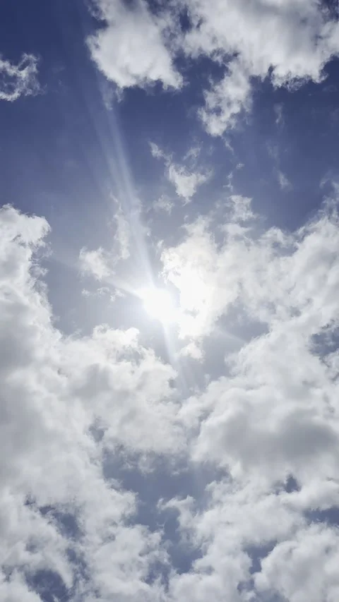 Sun Shining Through Bright White Clouds Stock Footage 345685124