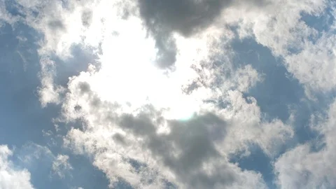 Sun shining through clouds Stock Footage 93017098