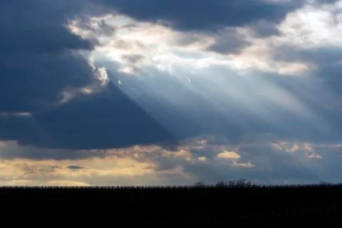 The sun shining through clouds Foto stock