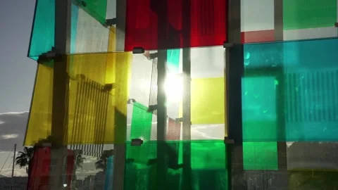 Sun shining through colorful windows of Pompidou center in Malaga, Spain Stock Footage 240013276