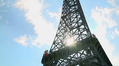 Sun shining through Eiffel Tower in Paris, France Stock Footage 40667345