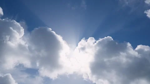 Sun Shining Through Moving Dramatic White Clouds Stock Footage 304442091