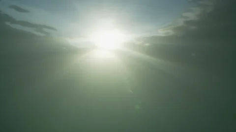 Sun shining through the water in the Artic Ocean – Underwater Shot Stock Footage 100600834