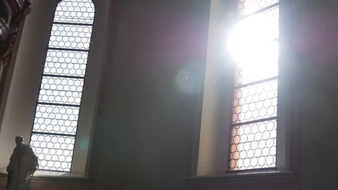 The sun shining through a window in an evangelical church Stock Footage 104879082