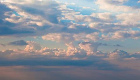 Sun shining thru clouds Stock Photos