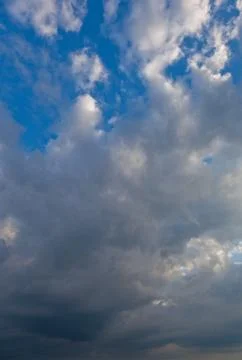 Sun shining thru clouds Stock Photos