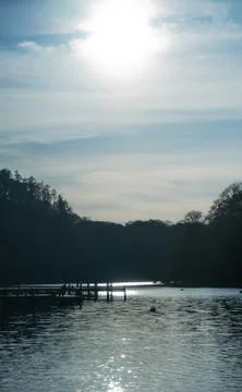 Sun shining on water in lock Stock Photos