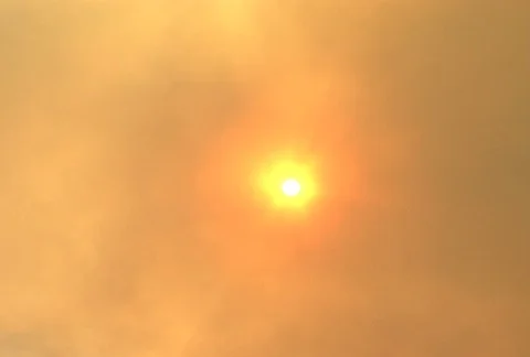 Sun shot thru smoke Stock Footage 98072291