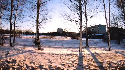 The sun is showing from behind the building. Shooting in motion on the road. Video stock 126792005