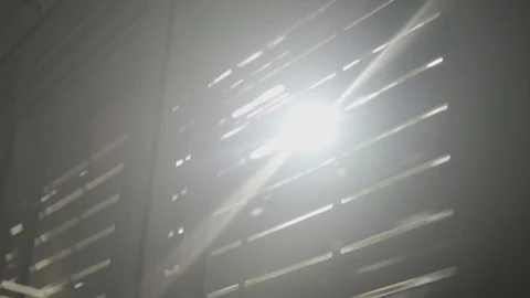 Sun showing through the cracks of electric blinds in apartment Stock-Footage 101460574