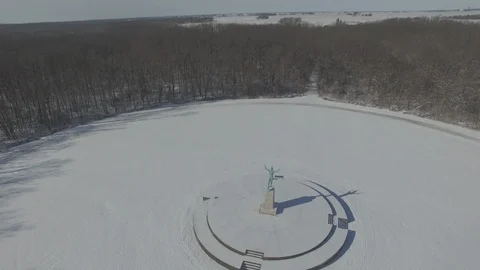 Sun Singer statue in Snow at Allerton Park [Orbit Right]2 Stock Footage 128467080