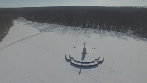 Sun Singer statue in Snow at Allerton Park [Orbit Right]3 Stock Footage 128467467