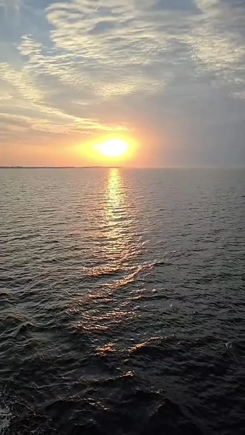 Sun Sinking Into the Sea, Ferry View of trip form Puttgarden to Rodby Stock Footage 340531371
