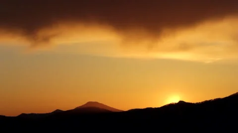 The Sun to Sit at the Top of the Mountain, Sunset in the Mountains, Sunset Stock Footage 63574386