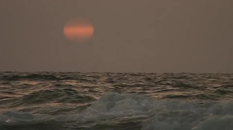 A sun sits down at-sea in a speed-up variant Stock Footage 41795851