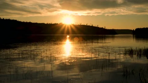 The sun sitting down the horizon. Video stock 151378683