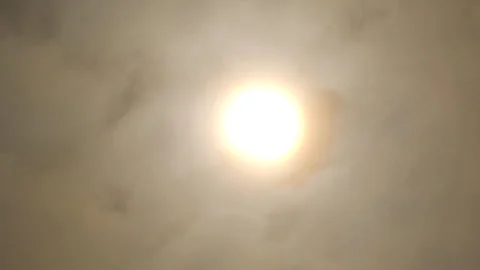 Sun in sky, behind light clouds Stock Footage 275045446