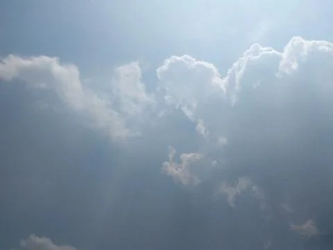 Sun in the sky with clouds Stock Photos