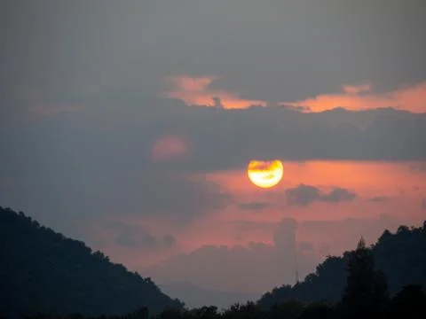 The sun in the sky in the evening time Stock Photos