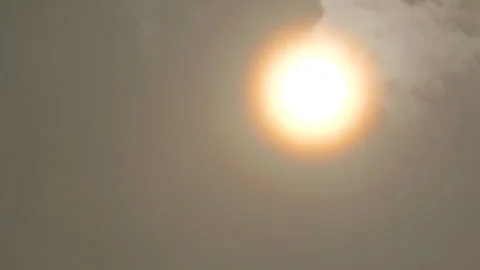 Sun in sky shining bright, single light cloud moving Stock-Footage 275045657