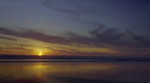 Sun slowly sets over the horizon Stock Footage 59924797