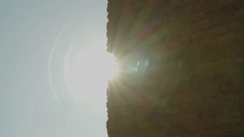 Sun Slowly Shining Through Ancient Stone Wall Stock-Footage 166146039