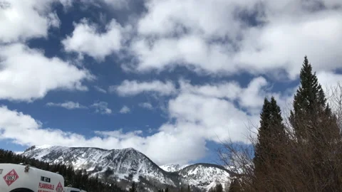 Sun Snow Sky mountain Pine Tree Stock Footage 156941734