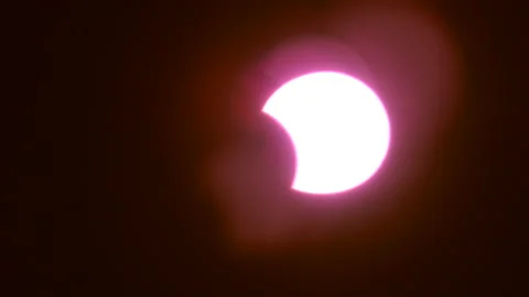 Sun solar eclipse on daytime by glasses protect light sunny Video stock 141008484