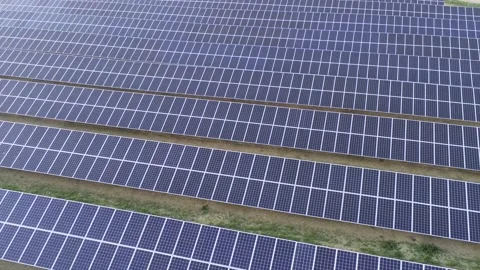 Sun on solar panels - Drone camera moves back Video stock 138874028