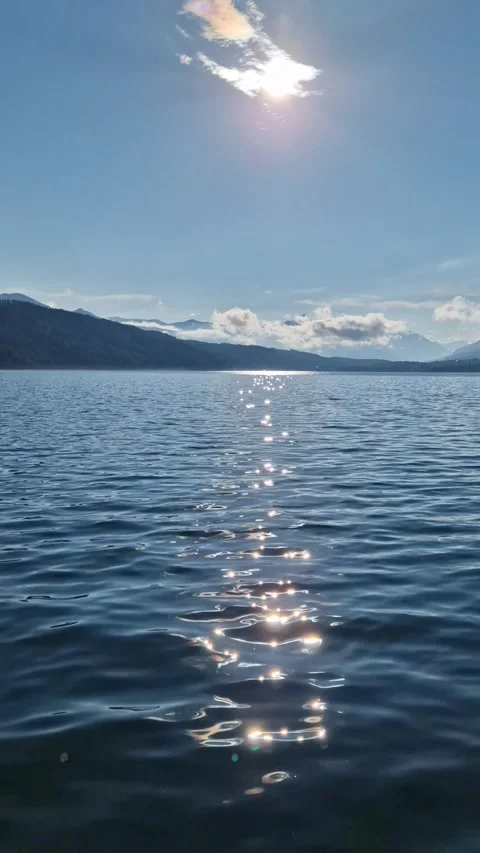 Sun Sparkling on Crystal-Clear Lake – Peaceful Panorama Video stock 316764829