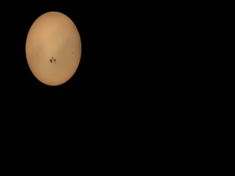 Sun spot traveling through a thin veil  of clouds Video stock 71426148