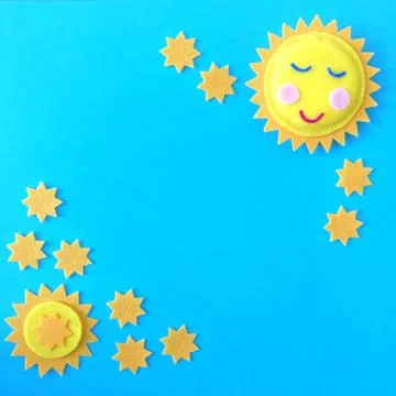 Sun Stars Composition on Blue Background Stock Photos