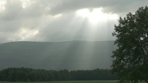 Sun Streaking through Clouds in Hudson River Valley Stock Footage 77469466