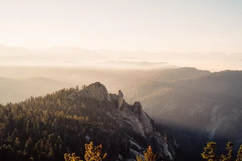 Sun Streaming Through Smoke after a controlled forest fire, Sequoia National Stock Photos