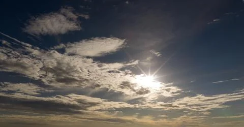 Sun sunlight on clouds. Sun in sky background. Sun radiant summer. Sun solar  Stock Photos