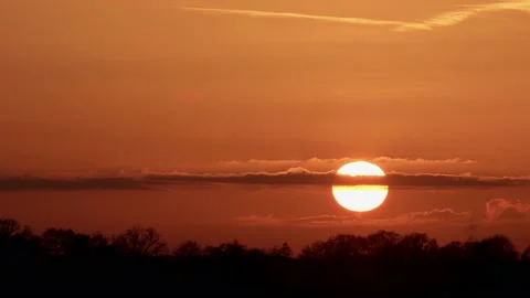 Sun sunset in the orange sky timelapse Stock Footage 194616539