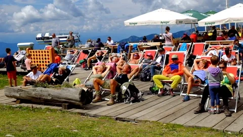 Sun Tanning on mountain Stock Footage 83921789