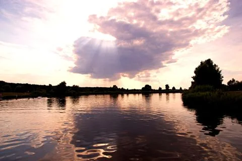 Sun through cloud Stock Photos