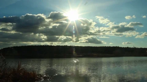 Sun through clouds Stock Footage 73569630