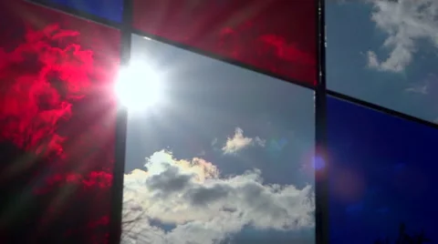 Sun throught stained-glass window on public square - Time lapse Stock Footage 55308297