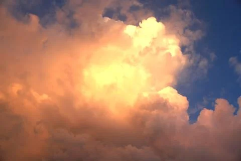 Sun throuht clouds. bright multi colored sunset clouds in the sky. Stock Photos