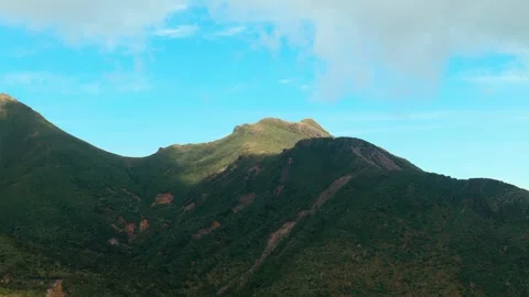 Sun touch top of mountain Stock Footage 260370069