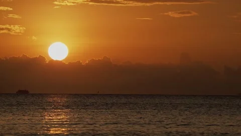 Sun touching horizon over tropical sea. Stock Footage 331124422
