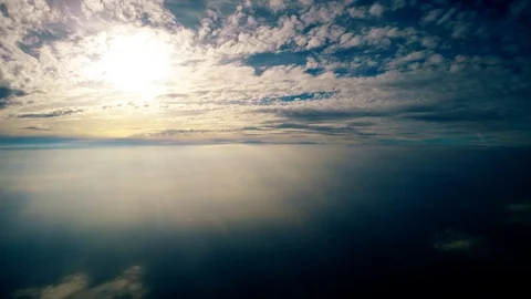 The sun twinkles through the clouds Video stock 96051629