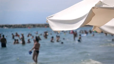 Sun umbrella and the beach Stock Footage 114433388