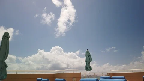 Sun umbrellas in wind Stock Footage 107948744