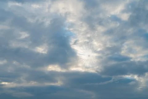 Sun under white clouds on a bright morning. Stock Photos